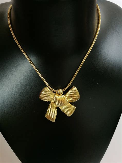 christian dior bow necklace gold|Christian Dior rhinestone necklaces.